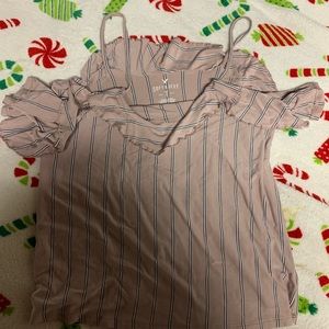 A tank top that is off the shoulders